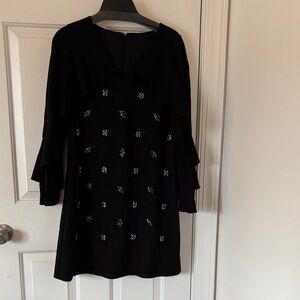 Kobi Halprin: Modern Black Dress with Embellishments of crystals